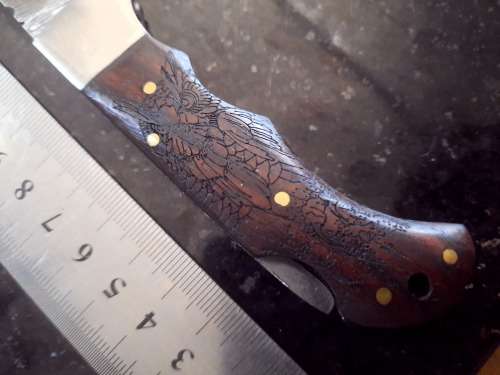 Handmade Damascus steel folding knife w Wooden Handle Scales. Pouch in bad shape, see pictures.