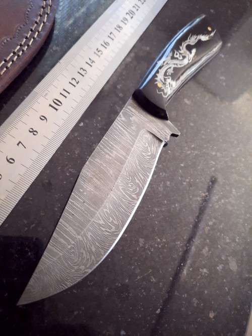 Handmade Damascus steel HUNTING  knife with Bull Horn handle scales.