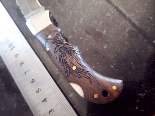 Handmade Damascus steel folding knife w Wooden Handle Scales. Pouch in bad shape, see pictures.