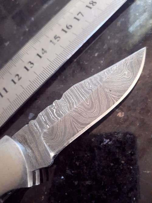 Handmade Damascus steel folding knife w Wooden Handle Scales. Pouch in bad shape, see pictures.