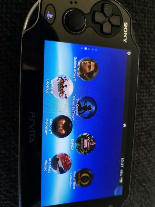 Ps vita slim with 32gig original card. Jailbroken on henkaku.