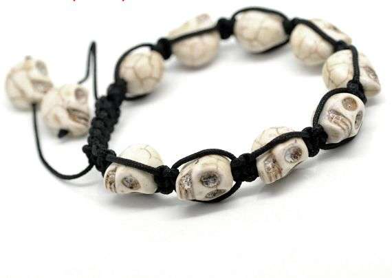 NEW LOOK OF HOWLITE SKULLS - 12MM   EACH  FITS 9- 11 INCH