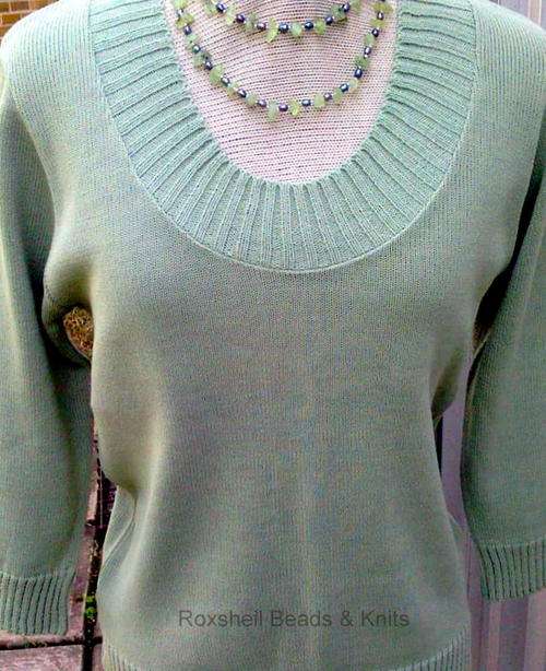 KNITTED PULLOVER, SUMMER  OR WINTER WEIGHT, DEEP U NECK 3.4 SLEEVES WITH RIBB DETAILTO 65CMI