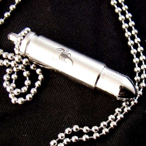STAINLESS STEEL BULLET WITH SCORPION IMPRINT  PENDANT WITH FREE THONG OR S.STEEL  BALL CHAIN