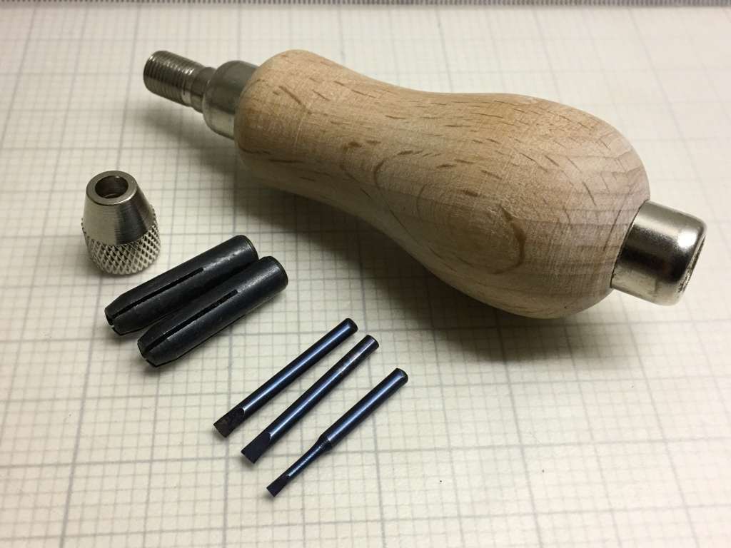 Hand pin vise with screwdriver blades