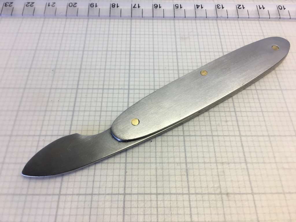Watch case back opener knife