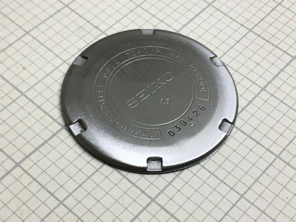 SEIKO 6602 - 7040 case back