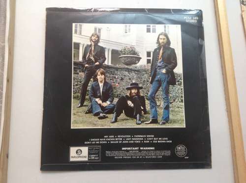 The Beatles LPs and set of figurines collection.