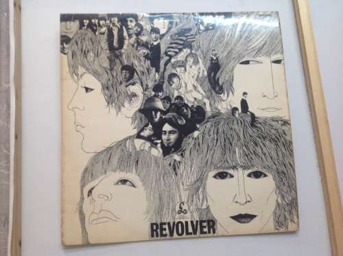 The Beatles LPs and set of figurines collection.