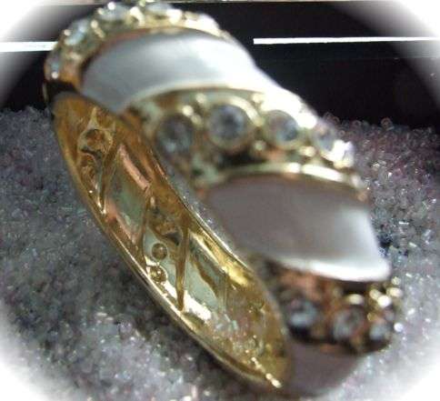 FANTASTIC NEWLY IMPORTED WHITE AND GOLDAUSTRIAN CRYSTAL HINGED BANGLE