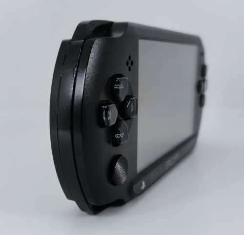 PSP Portable + 5 Games included