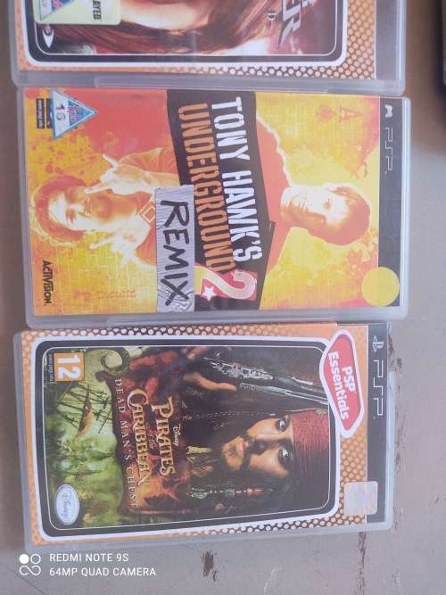 PSP Console + 4 games + carry case