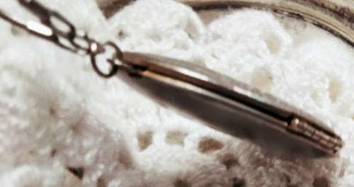 Unusual Necklace LOCKET hinged +Chain 2 tone metal outside embossed design+ silver inside gilt