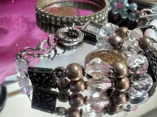4 bracelets Artisinal 3 mix cord  beads  base metal charms Crylic crystals spacer all one bid
