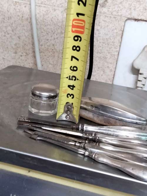 Antique box mixed pieces of Hallmarked Sterling SILVER manicure implements