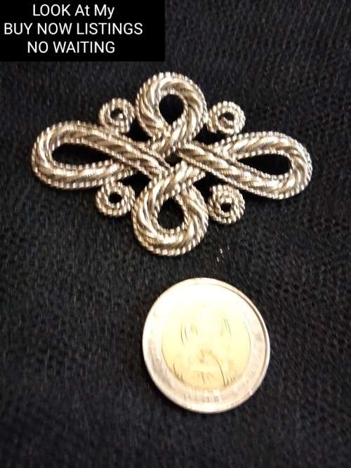 Silver Tone Metal Infinity Circles Brooch