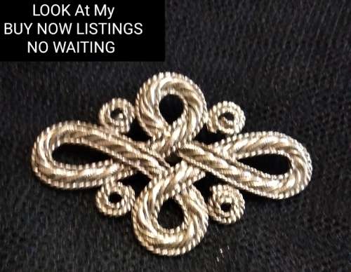 Silver Tone Metal Infinity Circles Brooch