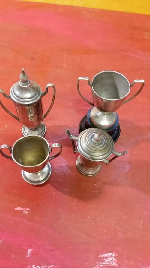 SET OF 4 MINIATURE VINTAGE TROPHIES