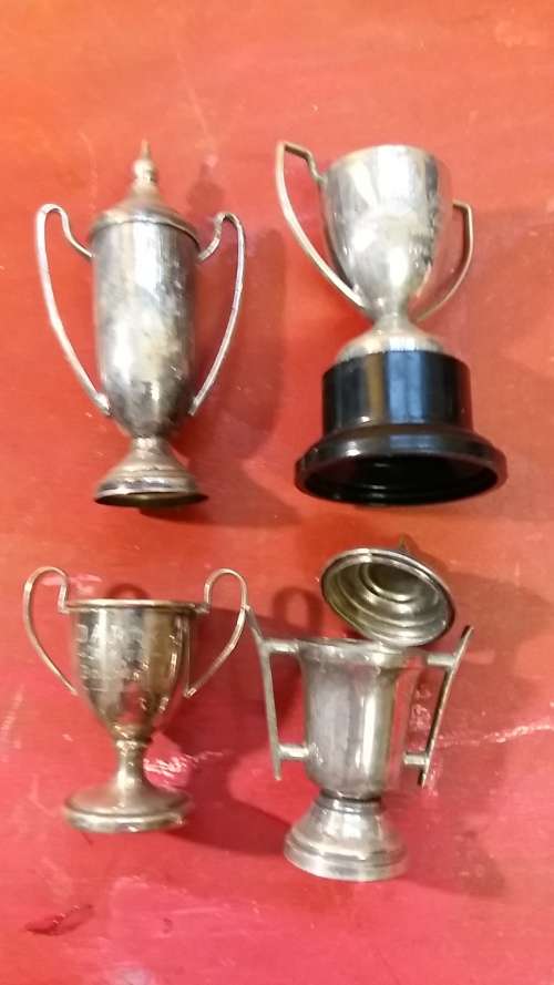 SET OF 4 MINIATURE VINTAGE TROPHIES
