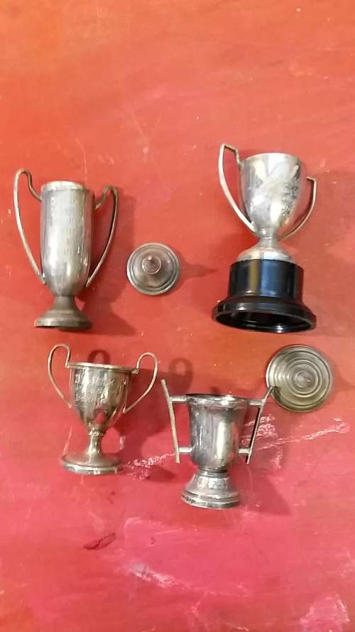 SET OF 4 MINIATURE VINTAGE TROPHIES