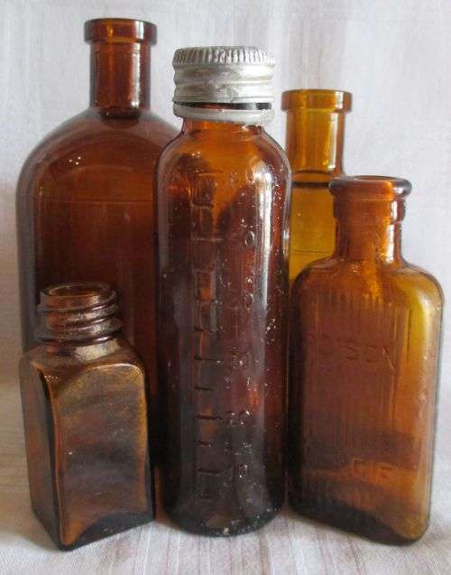 COLLECTION OF BROWN BOTTLES