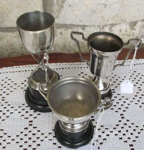 THREE SILVER PLATED TROPHIES