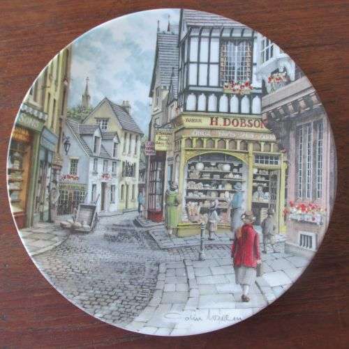 ROYAL DOULTON PLATE NO 5483A "THE BAKER,S SHOP "FROM THE SERIES   " WINDOW SHOPPING "