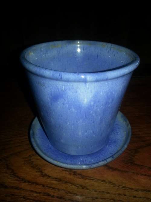 Linn Ware ceramic planter and drip tray in vibrant mauve glaze