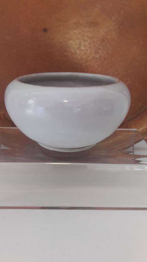 Collectible Linn Ware studio pottery bowl white glaze with mauve tints circa 1940's