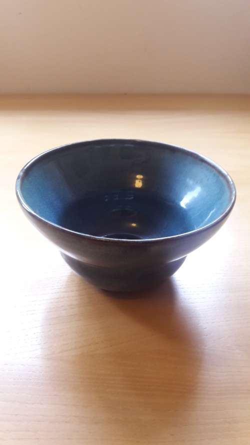 Collectible Linn Ware studio ceramic bowl in deep blue glaze circa 1940's/50's