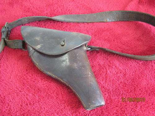 A Leather Moulded Holster with Shoulder Strap