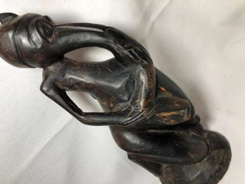 HIGHLY DETAILED HAND CARVED WOOD STATUE OF A CREATURE EATING 21cm