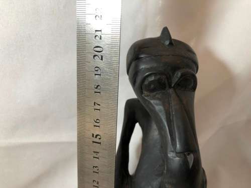 HIGHLY DETAILED HAND CARVED WOOD STATUE OF A CREATURE EATING 21cm