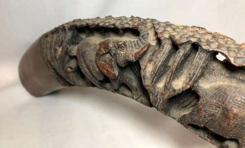 Unique wood carving of Elephants in a tusk shape - the perfect display piece