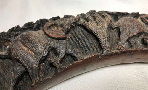 Unique wood carving of Elephants in a tusk shape - the perfect display piece