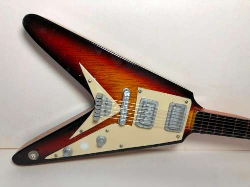 MINIATURE TOY REPLICA OF THE GIBSON FLYING V ELECTRICAL GUITAR