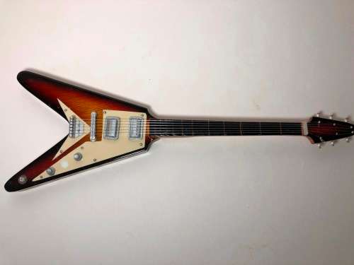 MINIATURE TOY REPLICA OF THE GIBSON FLYING V ELECTRICAL GUITAR