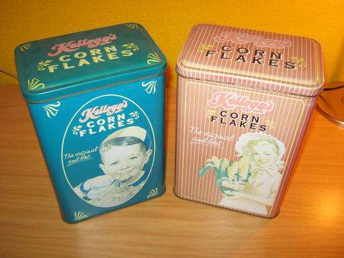 Two Kelloggs Cornflakes tins