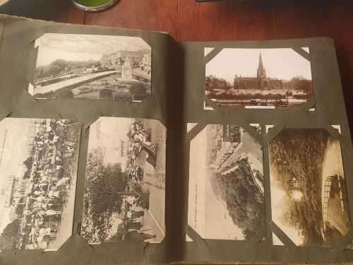 Vintage postcard album with 67 postcards