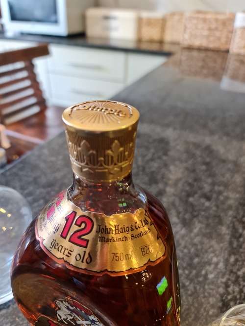 Dimple 12 Year Old 1980 Whisky Bottle