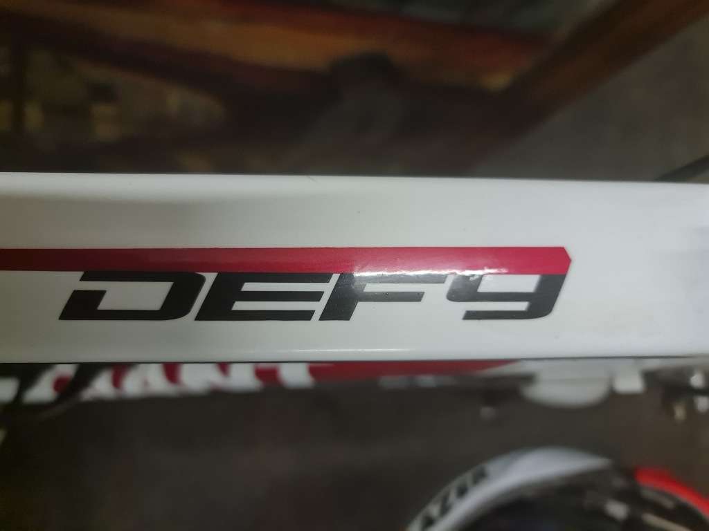 Giant Defy 9 Number 4 Road Bike and Lazer D2 Helmet