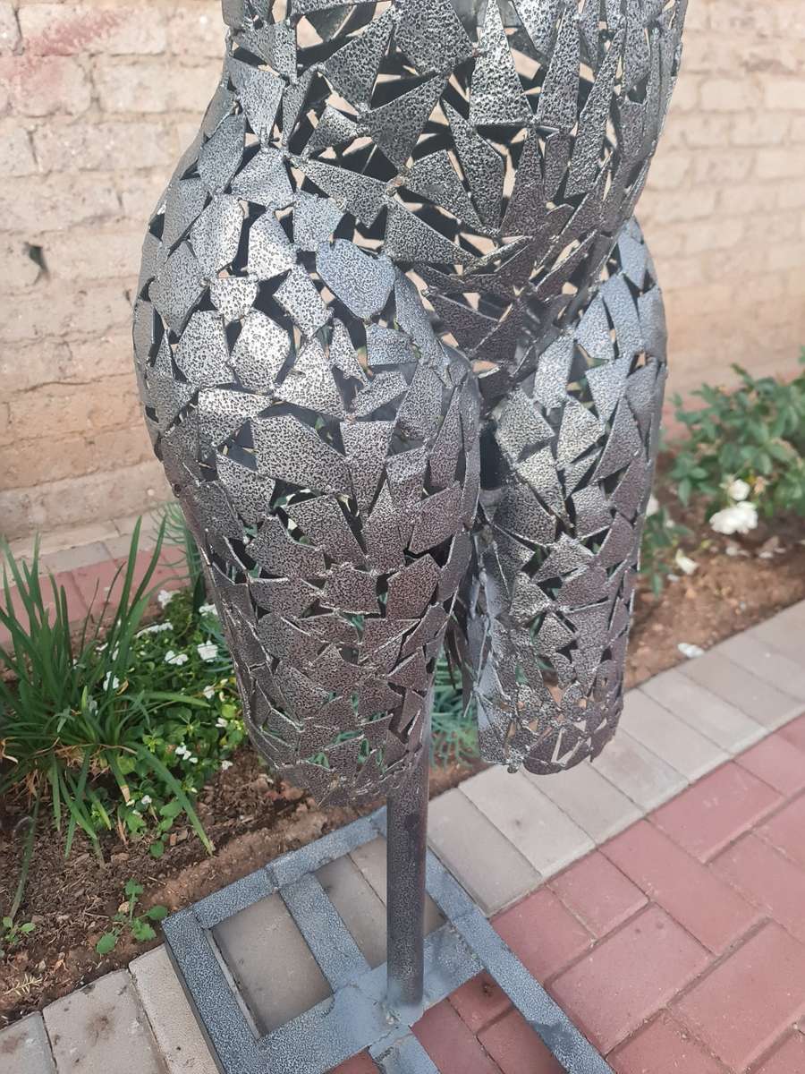 Hand Crafted Metal Female Torso Sculpture With a Metal Base
