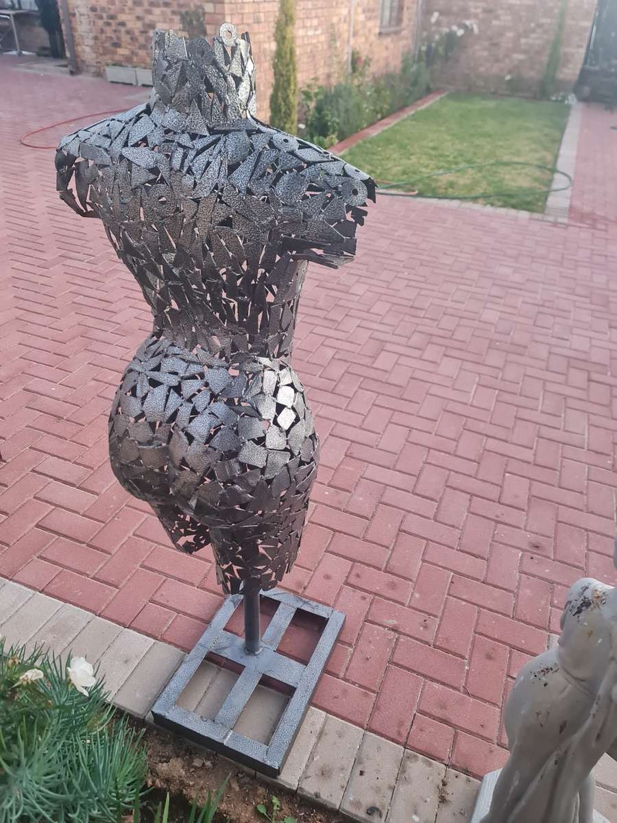Hand Crafted Metal Female Torso Sculpture With a Metal Base