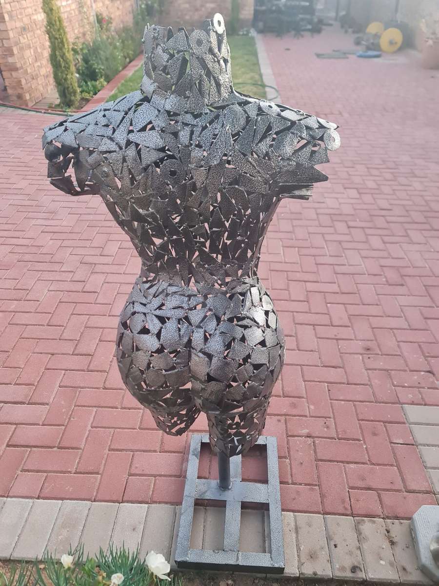 Hand Crafted Metal Female Torso Sculpture With a Metal Base