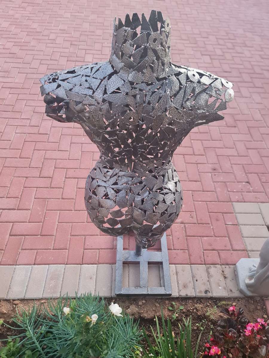 Hand Crafted Metal Female Torso Sculpture With a Metal Base