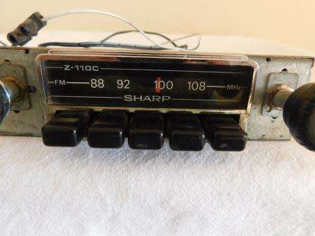SHARP CAR RADIO WITH 2 PANASONIC SPEAKERS INCLUDED