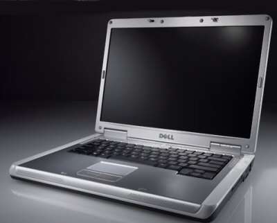DELL INSPIRON 1501 WHITE AND SILVER SUPERB MACHINE!!