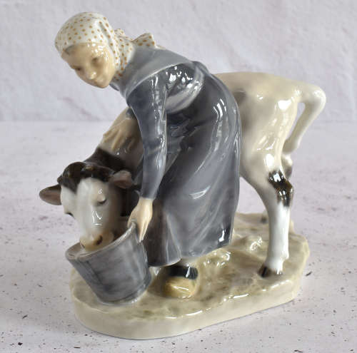 Royal Copenhagen Milkmaid Feeding Cow Figure
