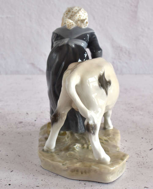 Royal Copenhagen Milkmaid Feeding Cow Figure