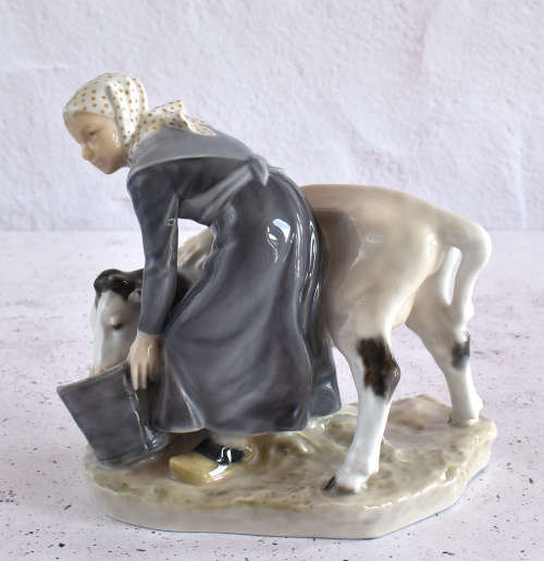 Royal Copenhagen Milkmaid Feeding Cow Figure